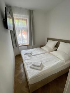 Tempat tidur dalam kamar di Villa Mila