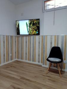 TV a/nebo společenská místnost v ubytování Ángeles home