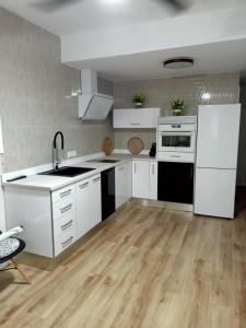 Kuchyň nebo kuchyňský kout v ubytování Ángeles home