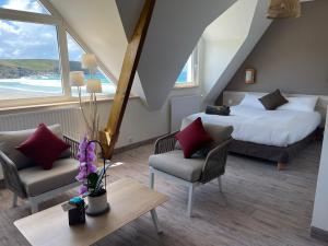 Postel nebo postele na pokoji v ubytování Le Relais de la Pointe du Van