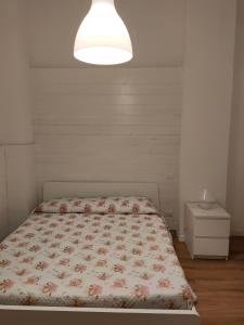 Ένα ή περισσότερα κρεβάτια σε δωμάτιο στο Maga12