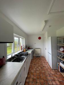 A kitchen or kitchenette at Machair House