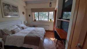 Postel nebo postele na pokoji v ubytování Bed & Breakfast Lastarria