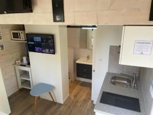 Kuchnia lub aneks kuchenny w obiekcie La petite maison d’Orphée
