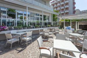 En restaurant eller et andet spisested på Hotel Vela d'Oro