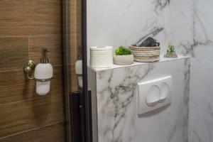 Ванная комната в Apartments-Rooms Stara Varos