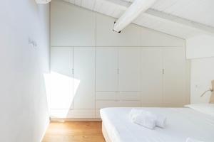 Posteľ alebo postele v izbe v ubytovaní EcoLoft Apartment - Best Choice - by Host4U