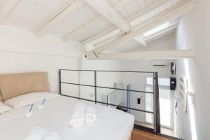 Posteľ alebo postele v izbe v ubytovaní EcoLoft Apartment - Best Choice - by Host4U