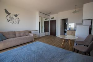 Posezení v ubytování Sunset Cove Apartment
