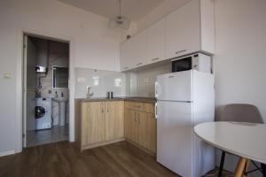 Kuchyň nebo kuchyňský kout v ubytování Sunset Cove Apartment + 6 fotografií