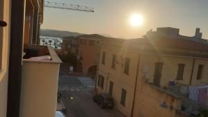 a view from a window of a street with a car at Capo Figari 15, appartamenti a Golfo Aranci in Golfo Aranci