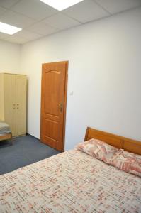 Voodi või voodid majutusasutuse Erasmus Rooms Economic- 24h self check-in toas