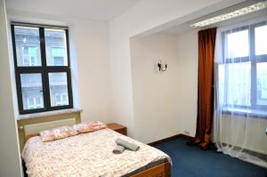 Katil atau katil-katil dalam bilik di Genius Rooms- 24h self check-in