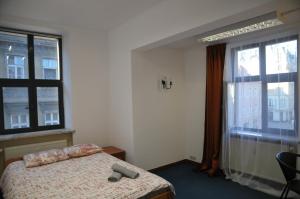 Katil atau katil-katil dalam bilik di Genius Rooms- 24h self check-in