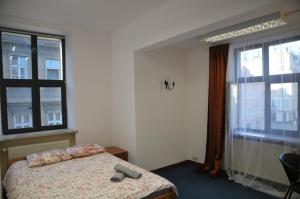 Katil atau katil-katil dalam bilik di Genius Rooms- 24h self check-in
