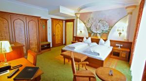 
Ein Bett oder Betten in einem Zimmer der Unterkunft Hotel am Schloßberg
