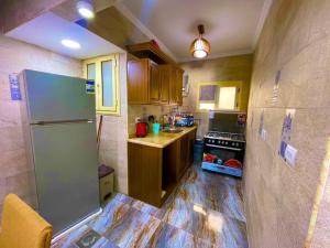 A kitchen or kitchenette at Italian Apartment