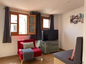 Televízia a/alebo spoločenská miestnosť v ubytovaní Casa Ferrers piso 5. Precioso ático con terraza