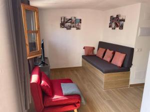 Posedenie v ubytovaní Casa Ferrers piso 5. Precioso ático con terraza