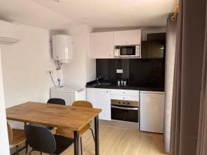 Kuchyňa alebo kuchynka v ubytovaní Casa Ferrers piso 5. Precioso ático con terraza + 17 fotografií