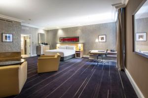 Postel nebo postele na pokoji v ubytování InterContinental Melbourne The Rialto by IHG + 37 fotografií