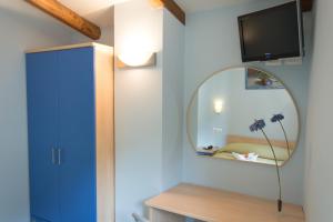 TV a/nebo společenská místnost v ubytování Minihotel IRIS