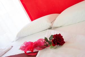 Postel nebo postele na pokoji v ubytování Minihotel IRIS