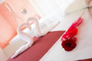 Postel nebo postele na pokoji v ubytování Minihotel IRIS
