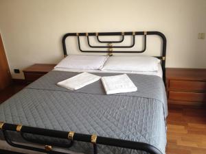 A bed or beds in a room at Star Hostel