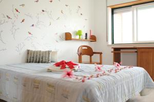 Giường trong phòng chung tại Canas Beach House - AL +41 ảnh