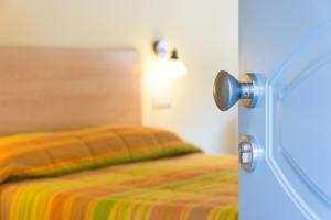 Postel nebo postele na pokoji v ubytování Minihotel IRIS