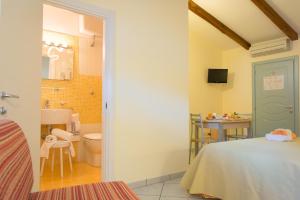 Postel nebo postele na pokoji v ubytování Minihotel IRIS