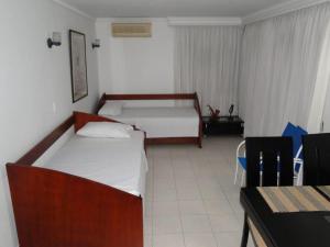 Un ou plusieurs lits dans un hébergement de l'établissement Apartamento en Cartagena Colombia