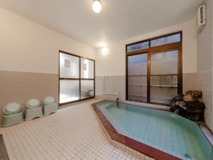 Bazén v ubytovaní Tabist Yamaga Onsen Yuyado Izumi alebo v jeho blízkosti