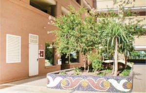 A garden outside Awesome Apartment In La Torre De La Sal