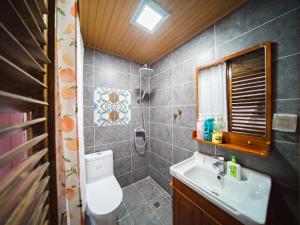 Ένα μπάνιο στο Tuo Tuo Guest House