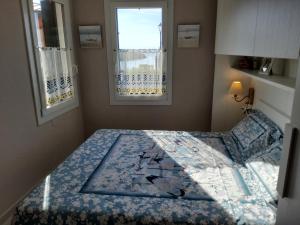מיטה או מיטות בחדר ב-Appartamenti Bellavista 107