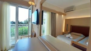 Postel nebo postele na pokoji v ubytování Lassi Hotel + 37 fotografií