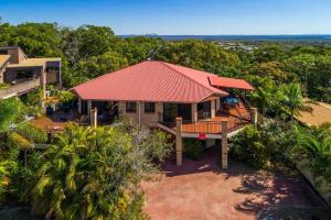 an aerial view of a house with a red roof at Sharon Lee 1 in Rainbow Beach