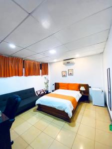 Katil atau katil-katil dalam bilik di Hotel Madrigal
