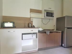 Kuchyň nebo kuchyňský kout v ubytování Villas Chaba
