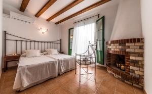 Ένα ή περισσότερα κρεβάτια σε δωμάτιο στο Apartamentos Mariano