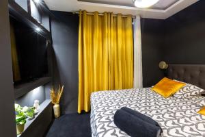 Posteľ alebo postele v izbe v ubytovaní La Golden Room