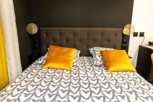 Posteľ alebo postele v izbe v ubytovaní La Golden Room
