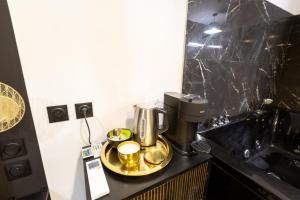 Kuchyňa alebo kuchynka v ubytovaní La Golden Room
