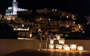 a table that has some candles on it at Apartamentos Mariano in Ibiza Town