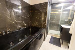 Kúpeľňa v ubytovaní La Golden Room