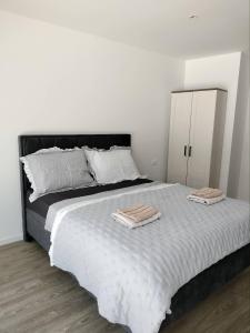 Posteľ alebo postele v izbe v ubytovaní Kaja Home