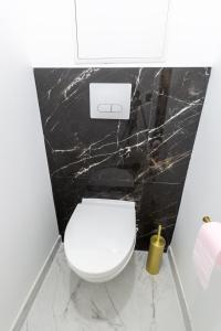 Kúpeľňa v ubytovaní La Golden Room
