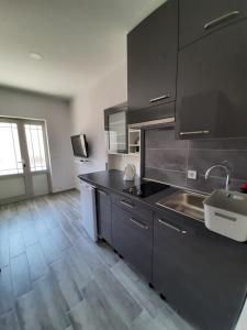 Køkken eller tekøkken på Apartment Luna